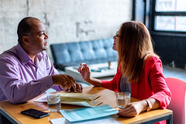 Two people have an animated and valuable conversation concerning the nature of a research topic.
